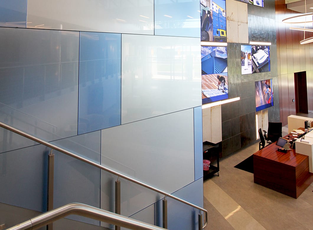 The elevator wall cladding in the CCM reception hall, by Archetype Glass
