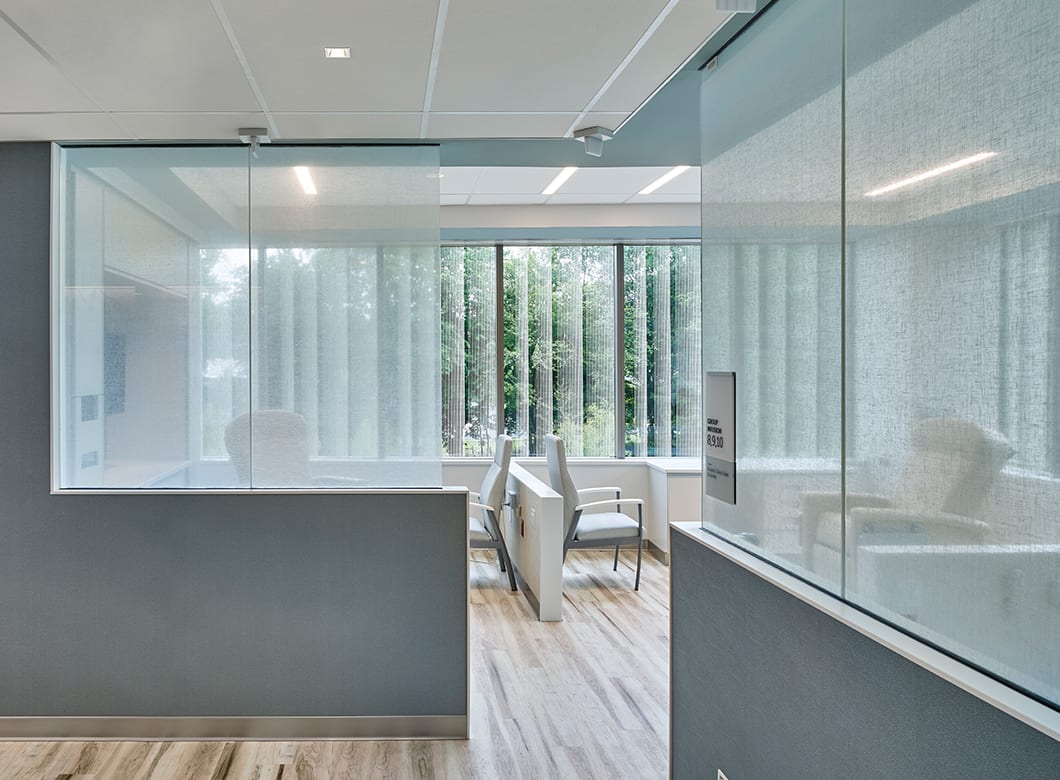 A view of the custom glass partition walls and custom glass doors at the Asplundh Cancer Pavilion