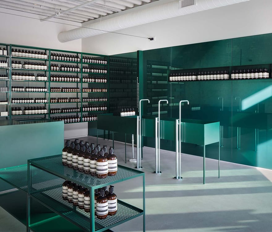 Archetype Glass' proprietary custom laminated Interpainted Color Glass in Aesop West Loop's retain interior design