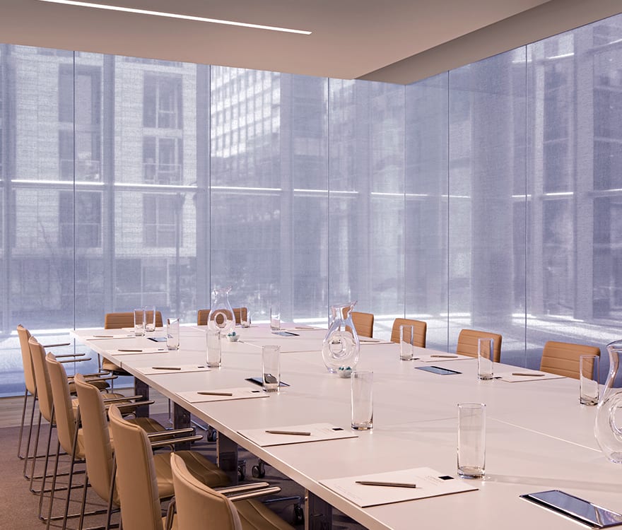 A view of the Archetype Glass crafted custom laminated fabric and metal glass in the Conrad Washington Hotel