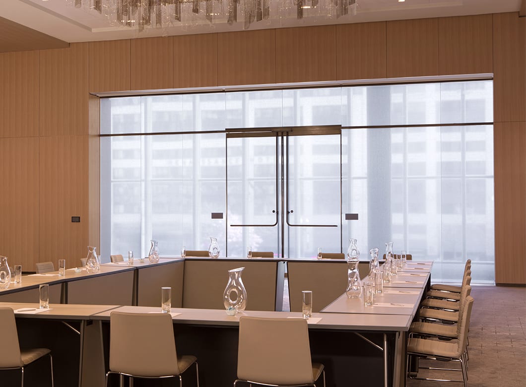One of the Conrad Washington Hotel's meeting rooms, featuring the custom glass partition walls, created by Archetype Glass