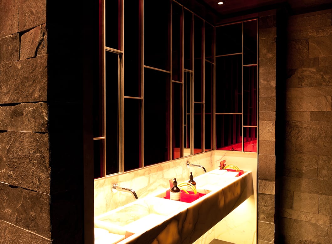 The custom bathroom mirrors in the Hakkasan Restaurant, created by Archetype Glass
