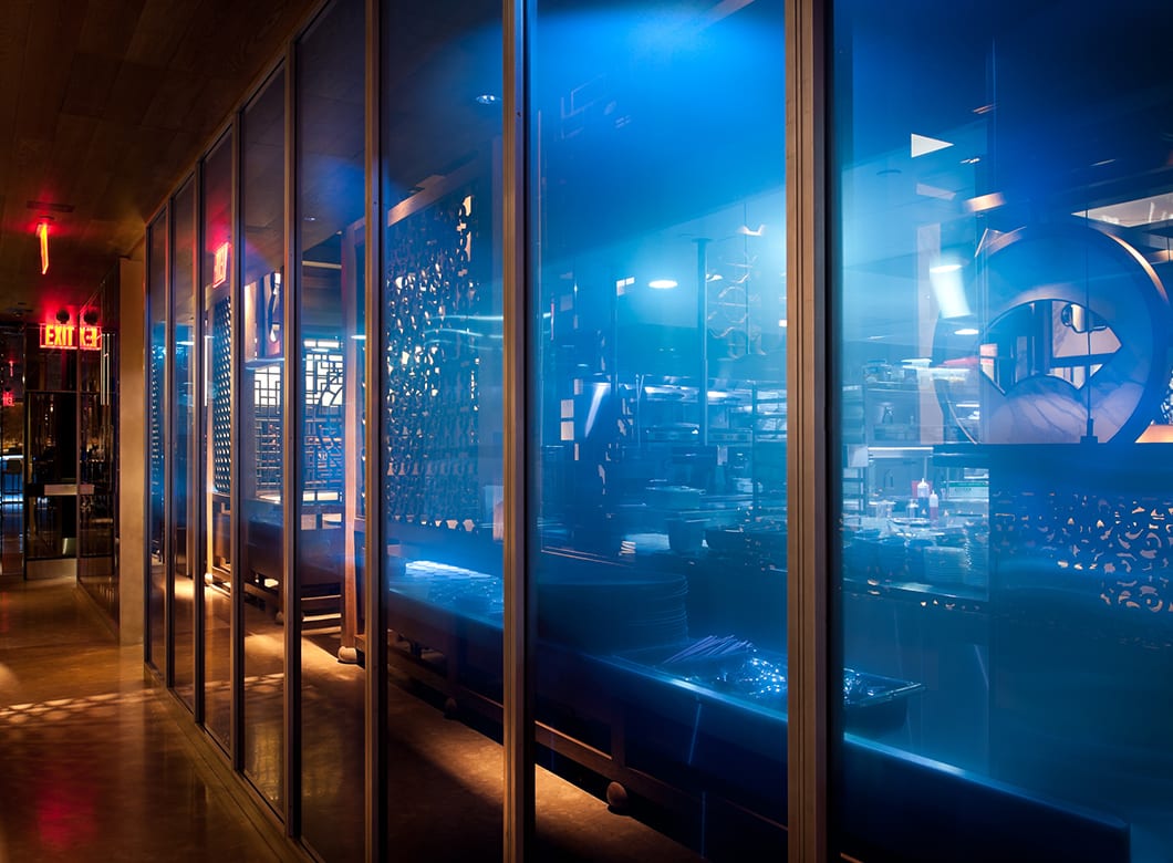 Custom glass partition walls at Hakkasan Restaurant, crafted by Archetype Glass