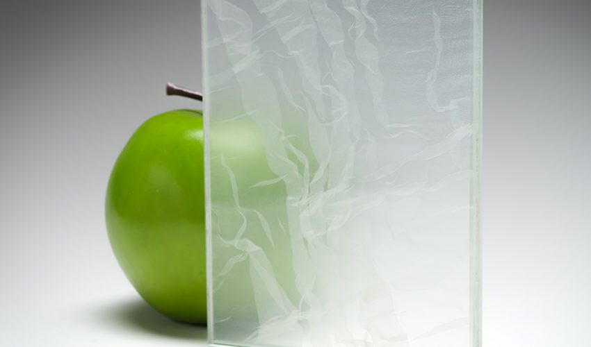 A clear transparent sample of the new custom fabric glass in coordination with Spatial Element.