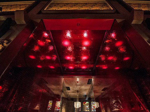 A detailed view of Archetype Glass' custom laminated wire mesh glass in the Tao Mohegan Sun casino in Connecticut