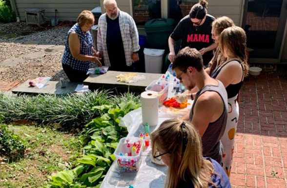 The team at Archetype Glass indulges in a little team building tie dye fun