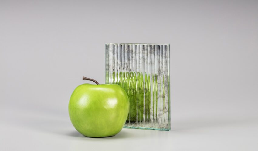Archetype Glass' custom laminated antique mirror with fluted surface glass, part of the 2024 QSP First Quarter Collection