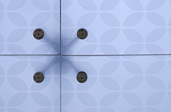 A detailed view of the installed custom laminated frosted glass and graphic glass created by Archetype Glass used in the UF Shands Hospital